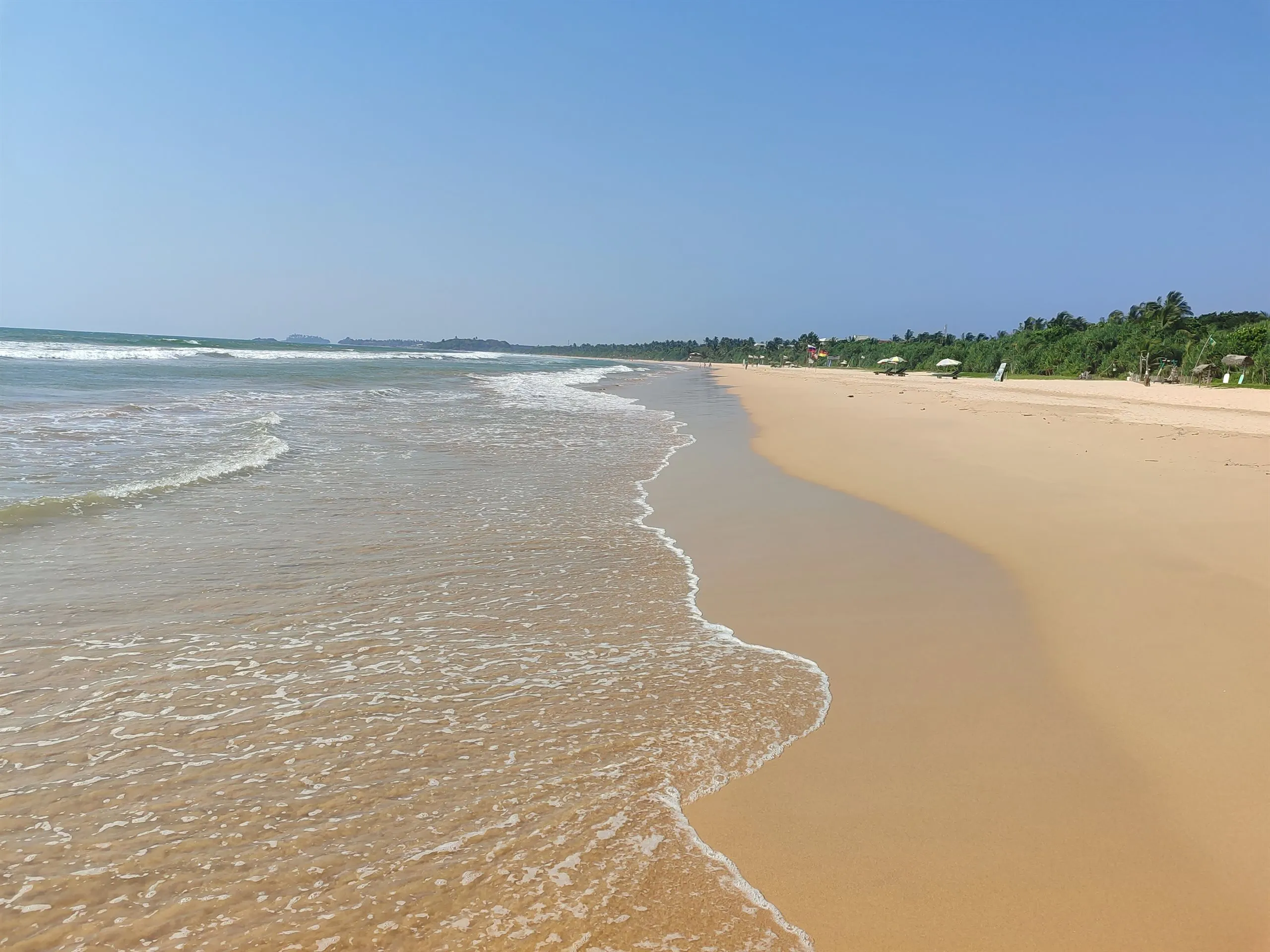 Empty sand and small surf early in the morning