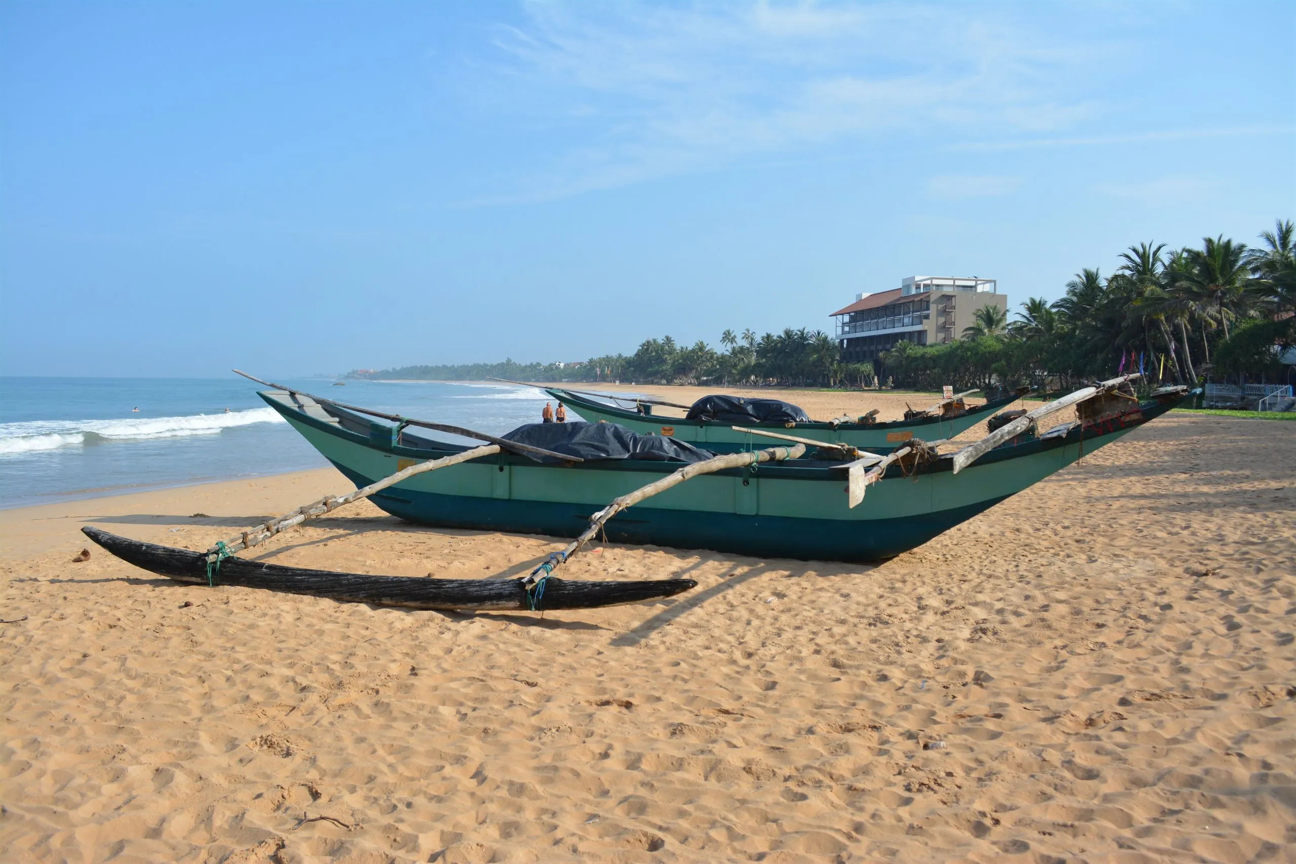 Fishing boats pulled up on the beach at Bentota